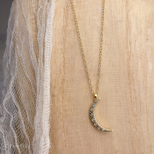 CRYSTAL CRESCENT MOON NECKLACE